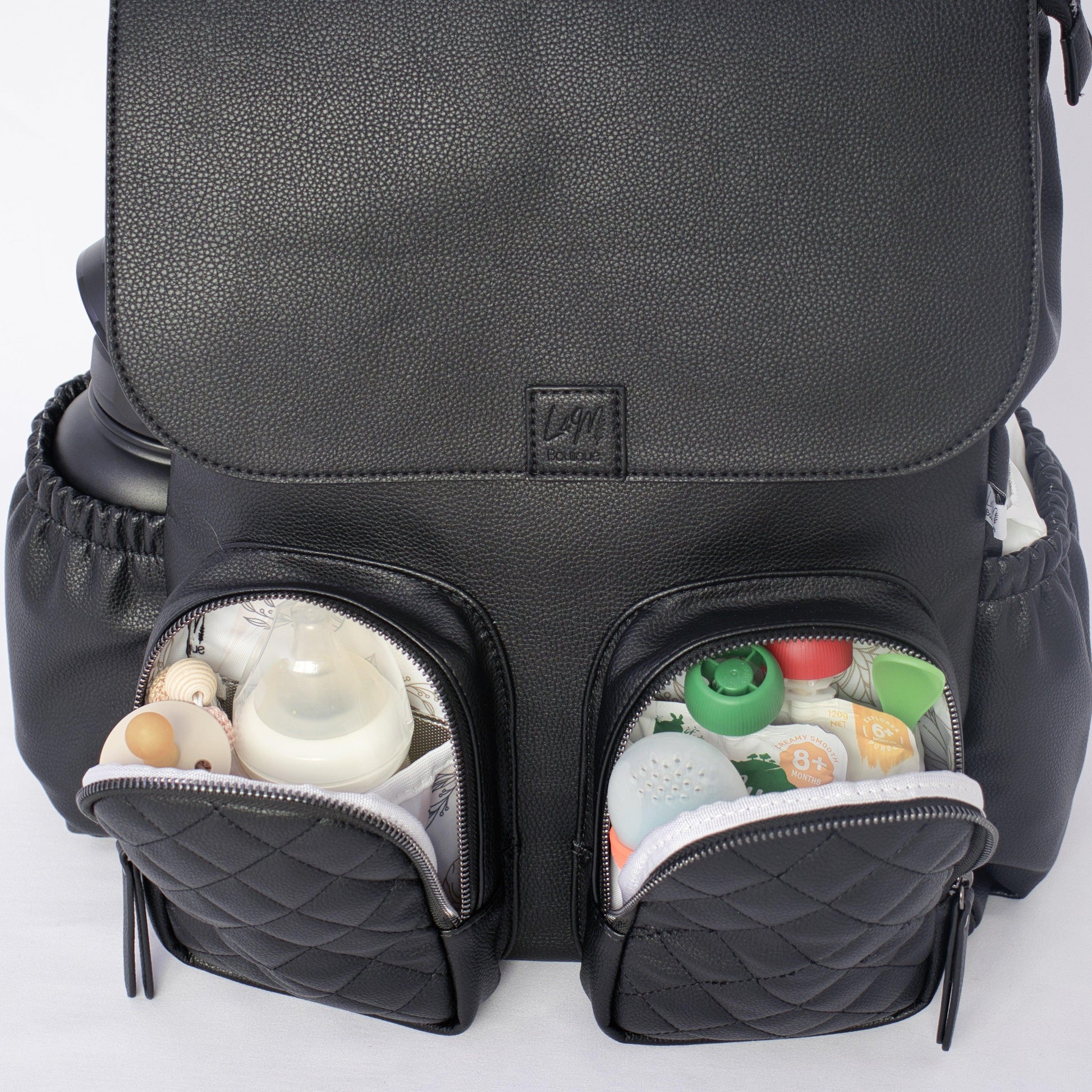 Milana Baby Bag Backpack in Matte Black by L&M Boutique with pockets for baby essentials 
